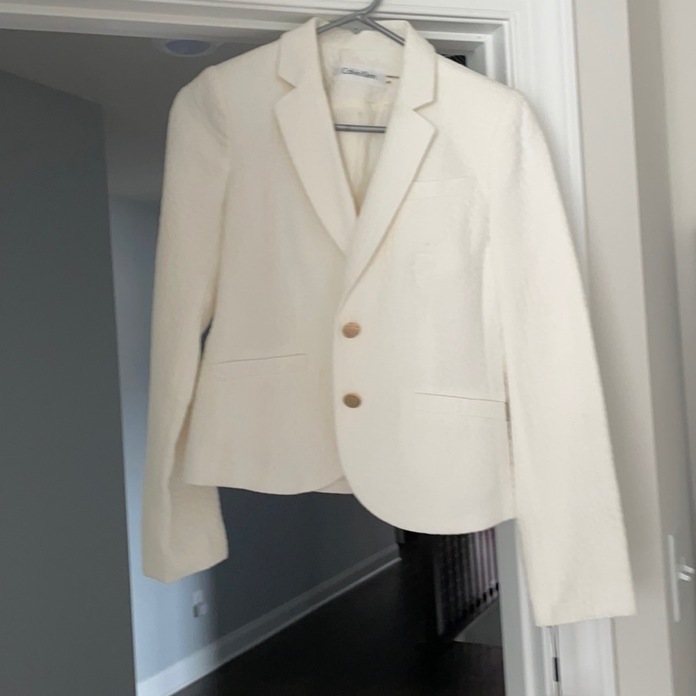 White Calvin Klein suit